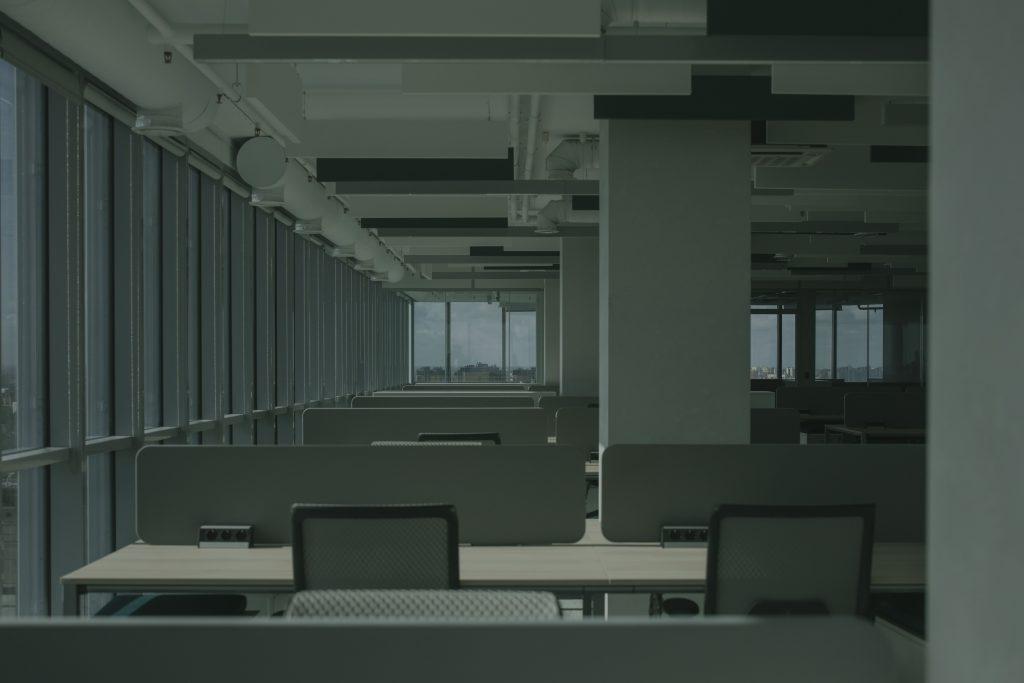Modern open-concept commercial office space representing $1000 minimum real estate investing, $1000 alternative investments, real estate tokenization platforms, and passive income from land shares through professionally managed commercial real estate opportunities.